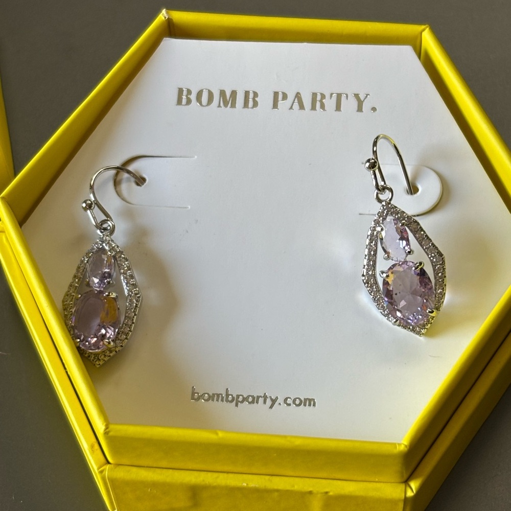 Silver and Purple Dangle Earrings with Intricate Design